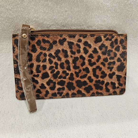 IMAN Handbags - IMAN Leopard Print Clutch with Wristlet